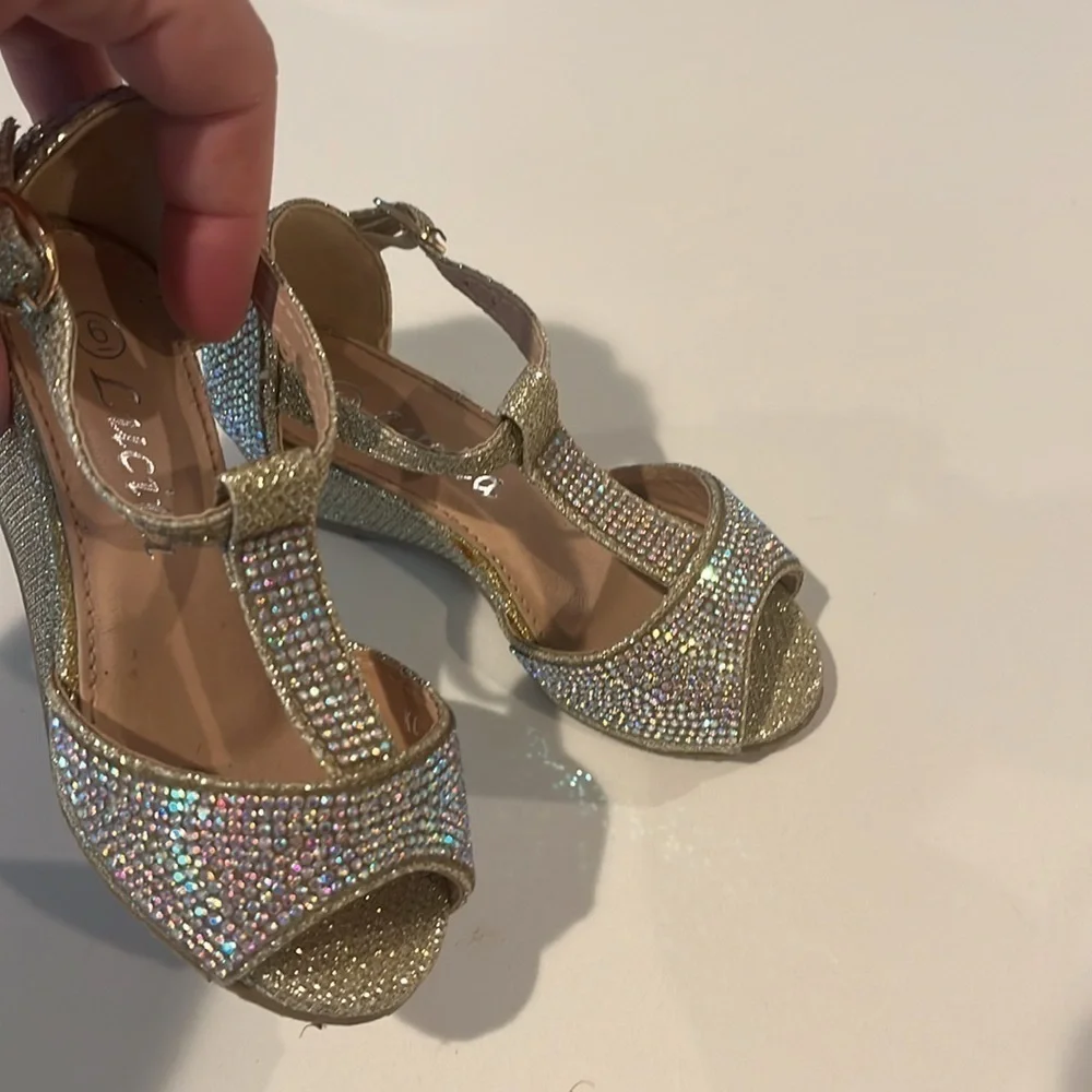 Gold sequined children’s dress shoes